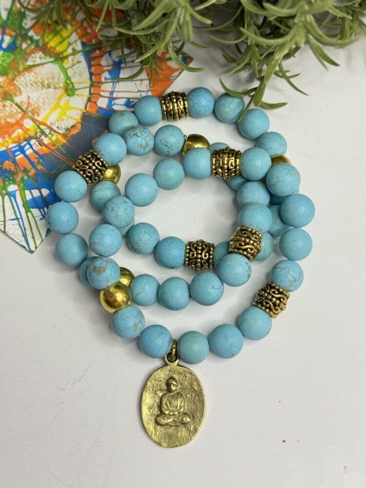 Howlite with Gold Beads and Tibetan Charm