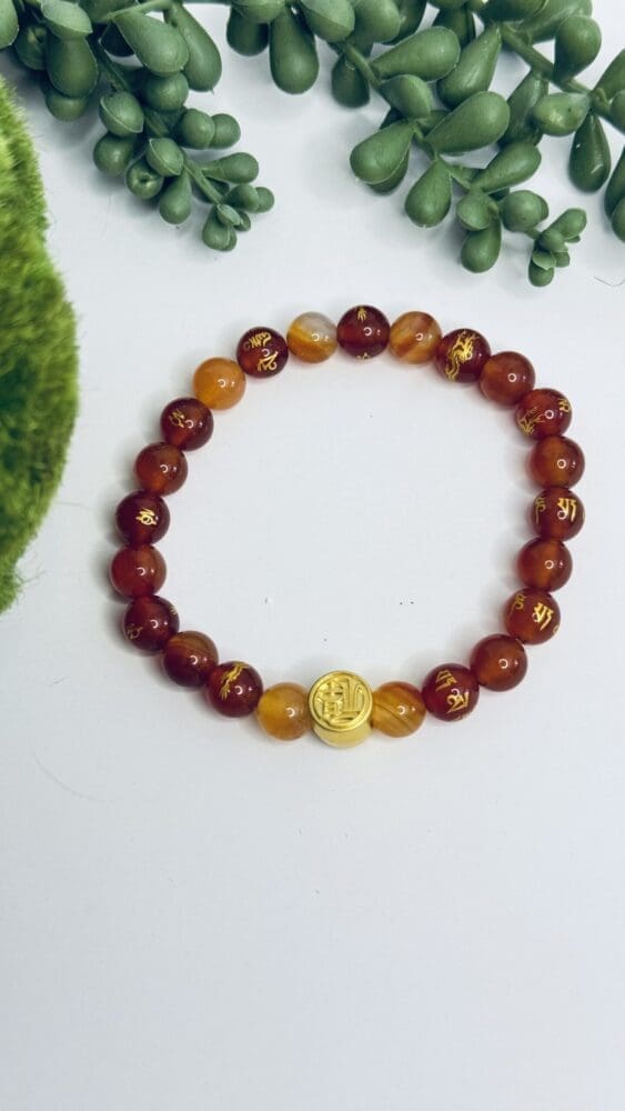 Orange Asian Crystal Beads with Gold Charm