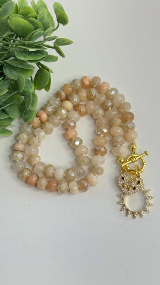 Plated Aventurine, Silk Knotted with Micro Pave Sun and Heart Charms