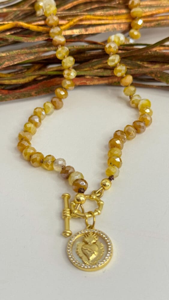 Faceted Plated Agate, Silk Knotted with Sacred Heart Pendant