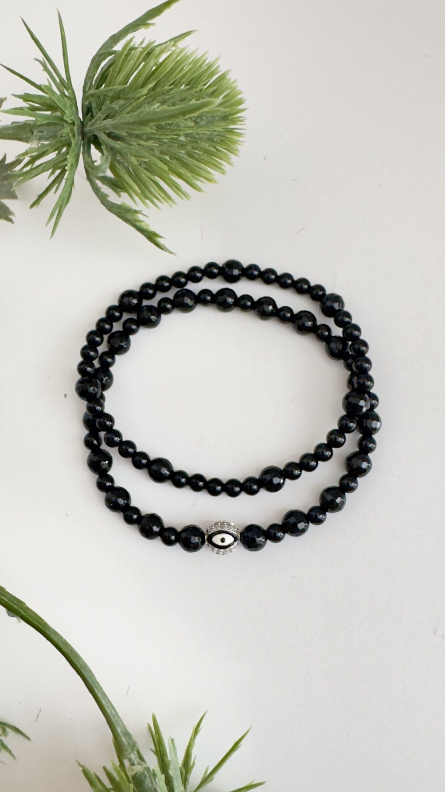 Black Onyx w/silver evil eye